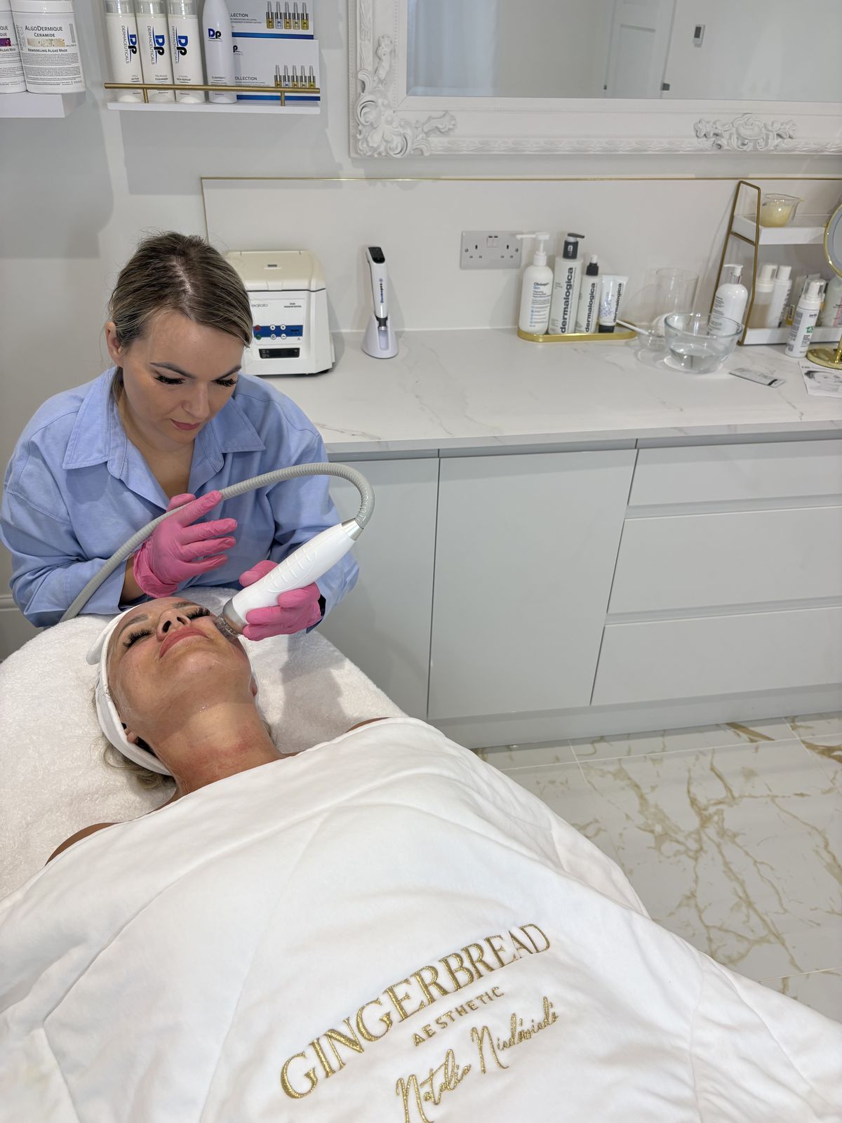 Hydrogen-water facial treatment being performed at Gingerbread Aesthetic, Towcester